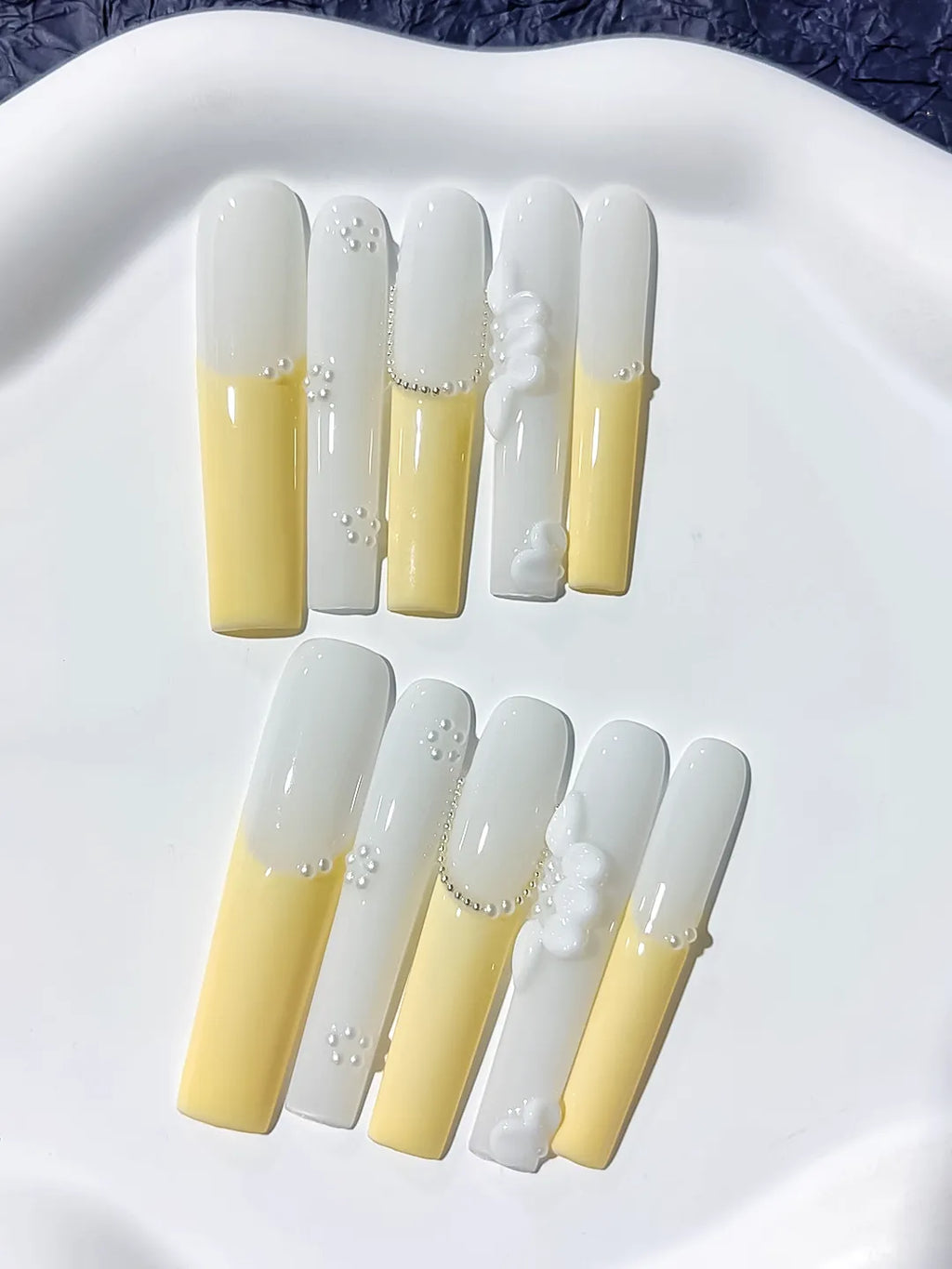 White Yellow Silver French tip Flower Pearl Chain press on nails close up