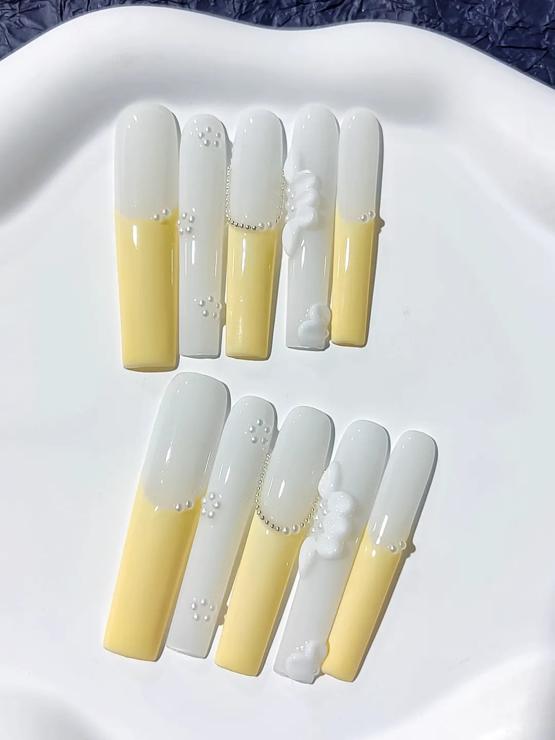 White Yellow Silver French tip Flower Pearl Chain press on nails close up