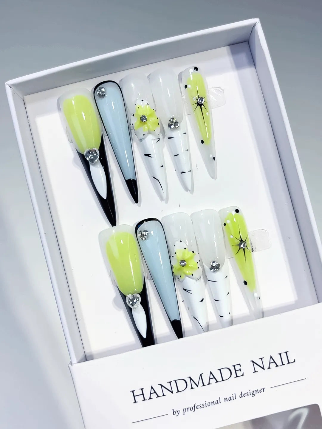 Green White Black Blue Silver Abstract Flower Rhinestone press on nails angled view