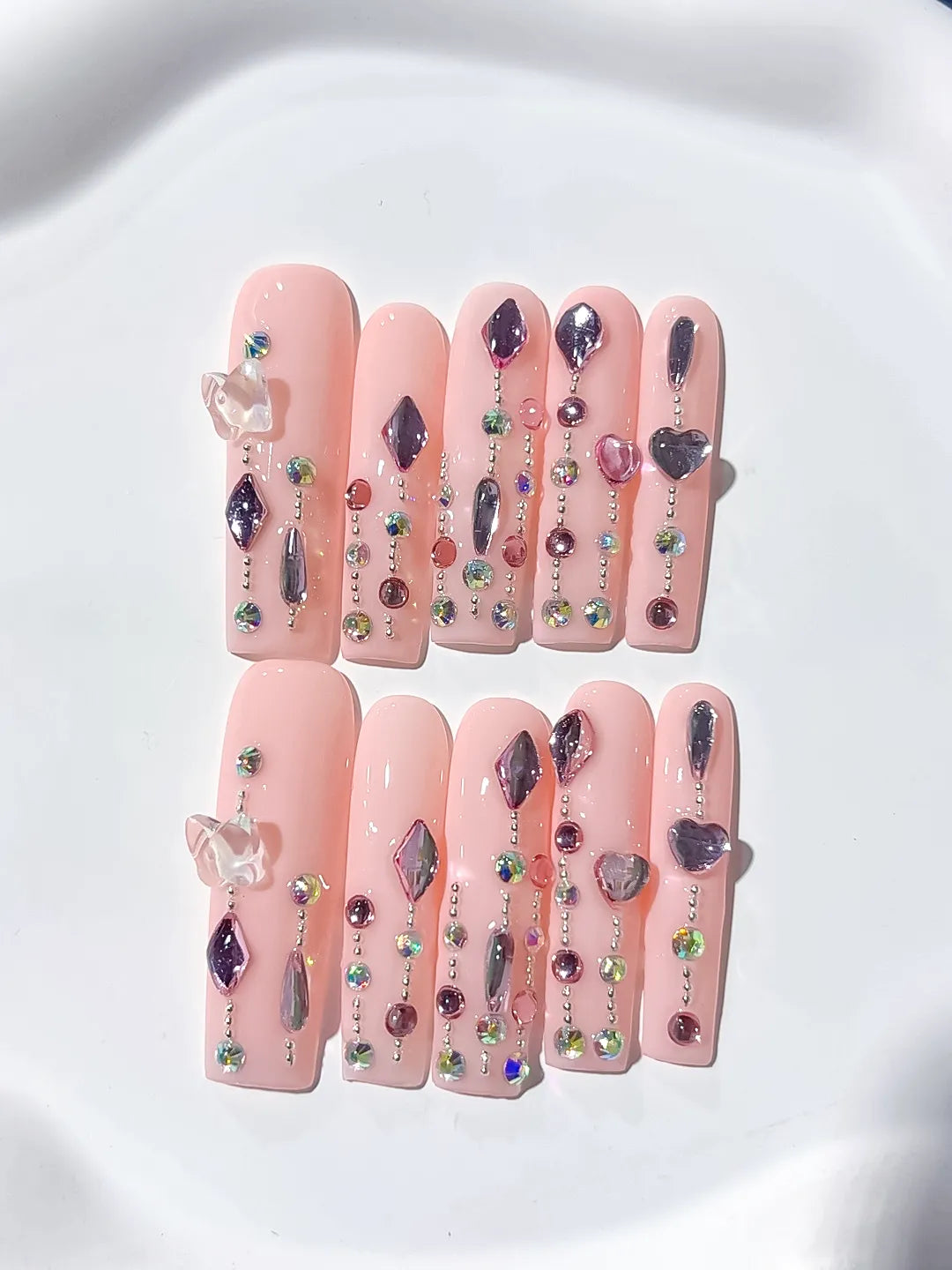 Pink Purple Silver Solid color Heart Rhinestone Shell 3D press on nails close up