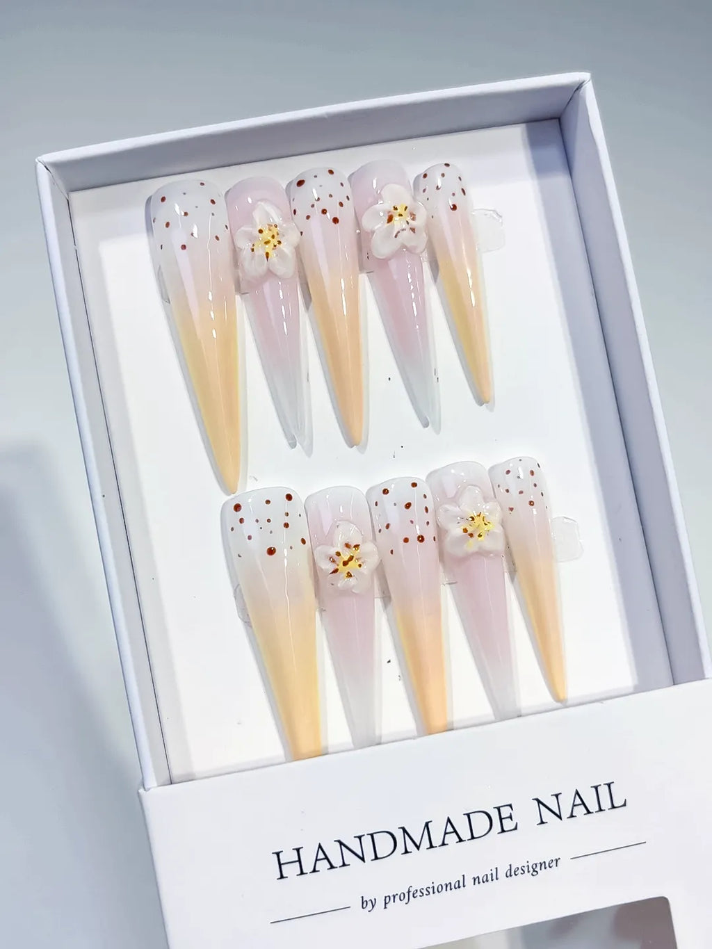 White Yellow Nude Pink Brown Ombre Flower Dot 3D press on nails angled view