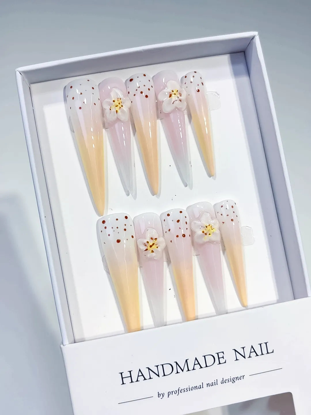 White Yellow Nude Pink Brown Ombre Flower Dot 3D press on nails angled view