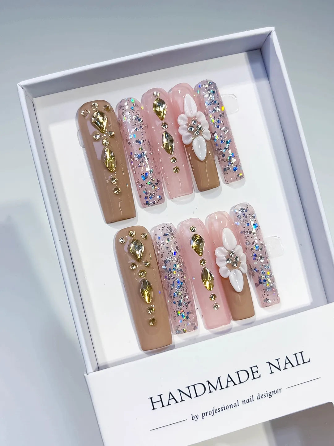 Nude Pink Silver Gold White Glitter Flower Rhinestone Metallic Accent 3D press on nails angled view
