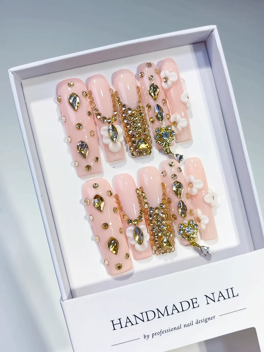 Pink Nude Gold White Silver Solid color Flower Rhinestone Chain Metallic Accent 3D press on nails angled view