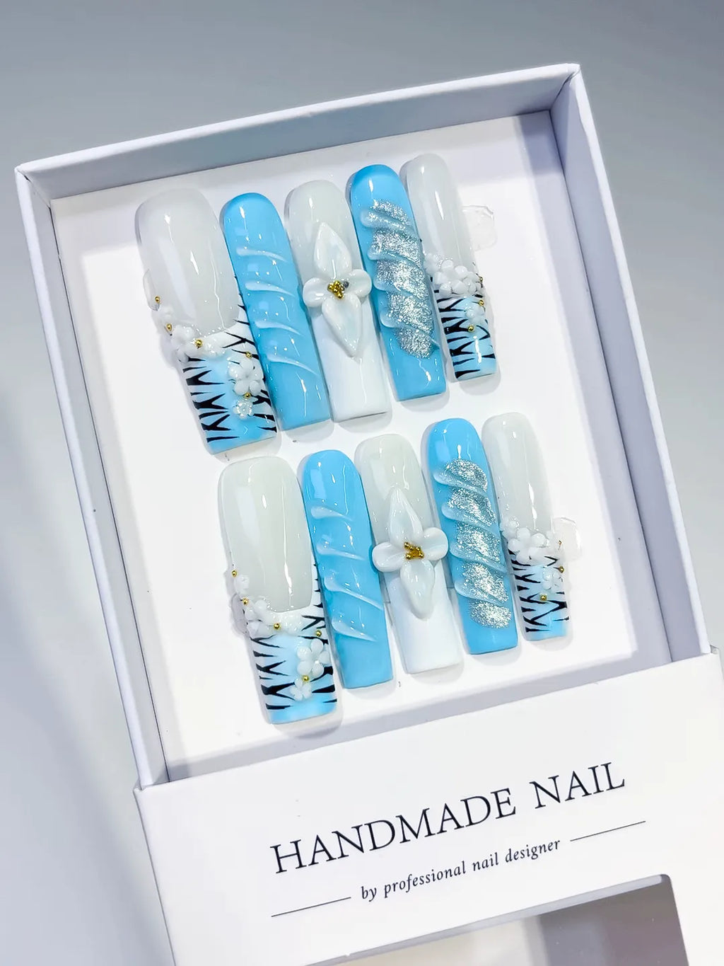 White Blue Silver Black Gold Abstract Flower Glitter Animal Print 3D press on nails angled view