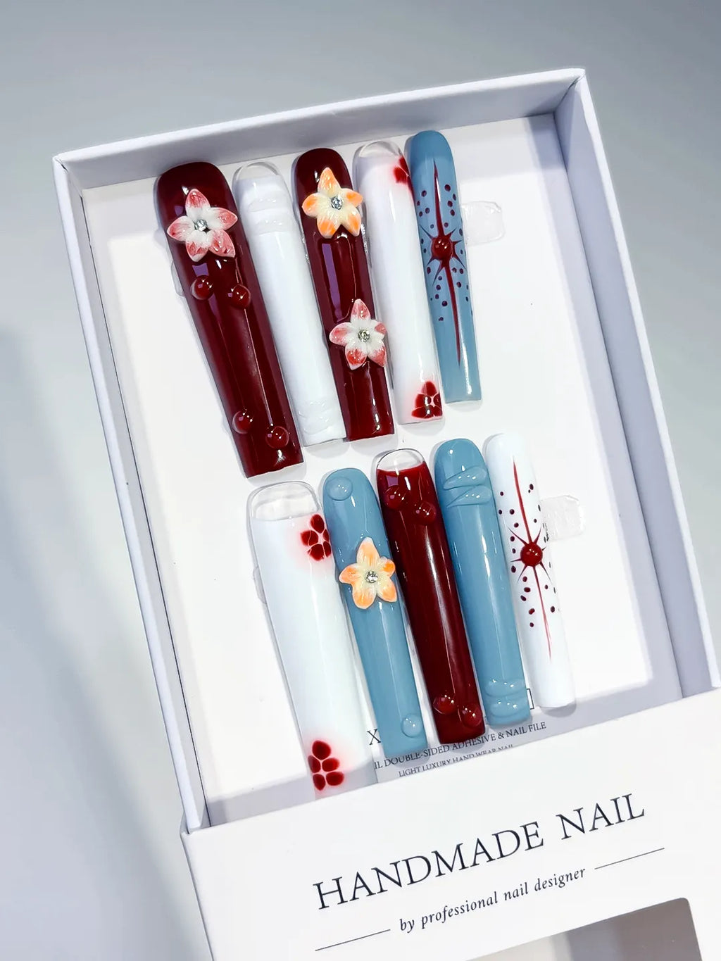 Red White Blue Orange Abstract Flower Dot 3D press on nails angled view