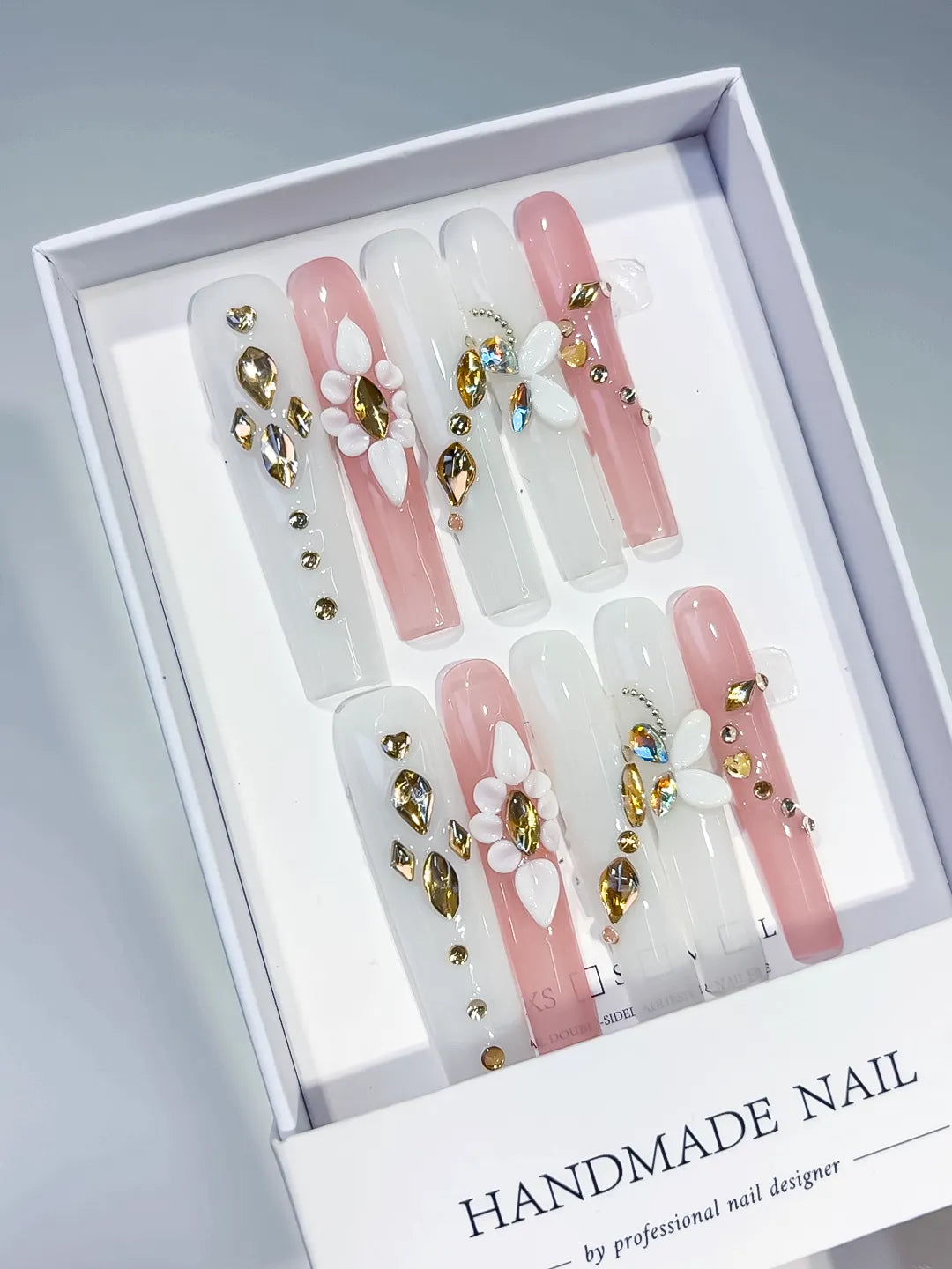 White Pink Gold Solid color Flower Rhinestone Metallic Accent 3D press on nails angled view