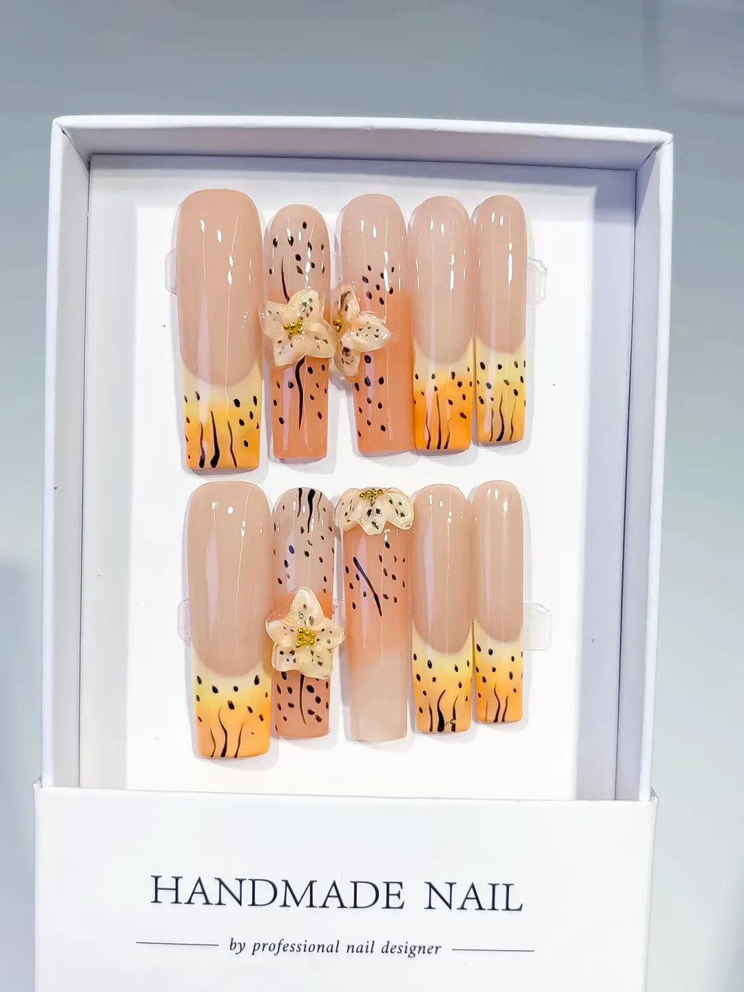 Nude Orange Yellow Black Abstract Flower Animal Print 3D press on nails full set view