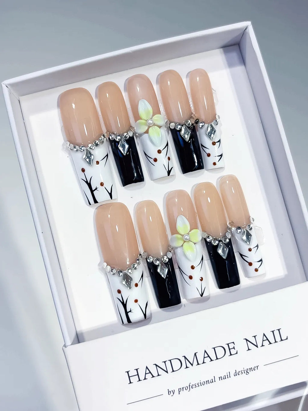 Nude White Black Green Silver Abstract Flower Rhinestone Metallic Accent 3D press on nails angled view
