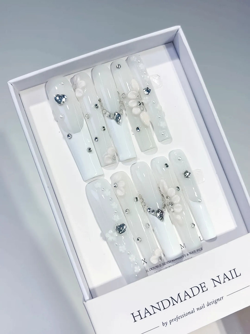 White Silver Solid color Heart Flower Rhinestone Pearl 3D press on nails angled view