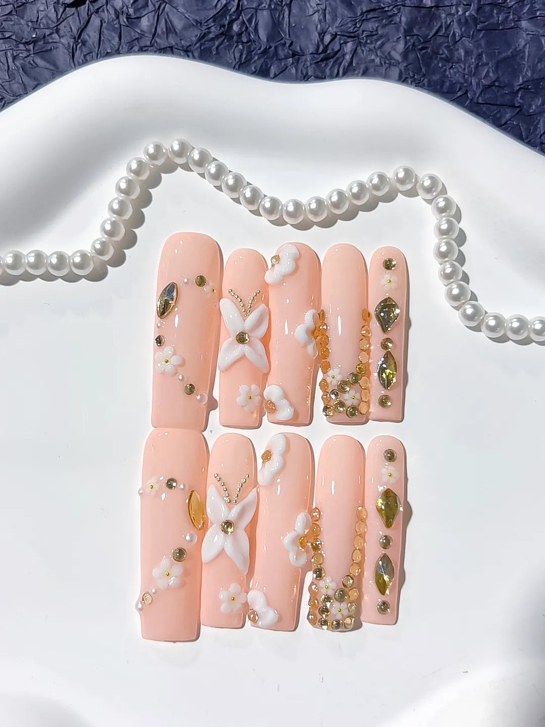 Pink Gold White Solid color Flower Pearl Chain Metallic Accent 3D press on nails detail view