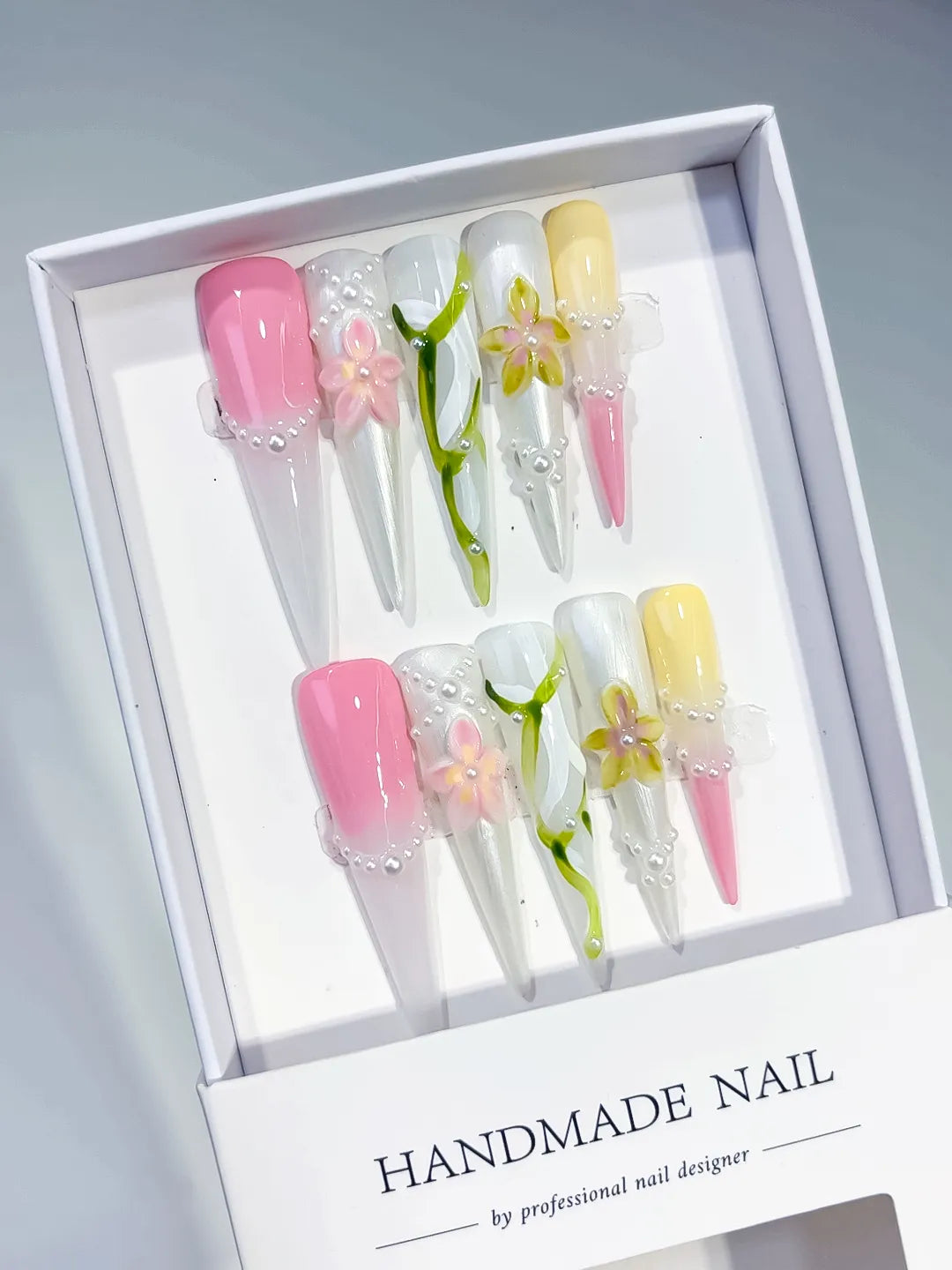 White Pink Yellow Green Abstract Flower Pearl 3D press on nails angled view