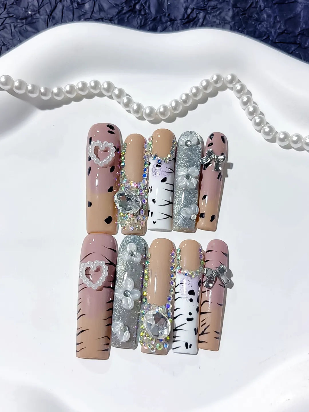 Nude White Silver Black Glitter Heart Bow Pearl Rhinestone Animal Print 3D press on nails detail view
