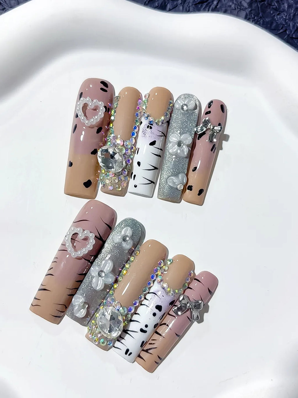 Nude White Silver Black Glitter Heart Bow Pearl Rhinestone Animal Print 3D press on nails detail view