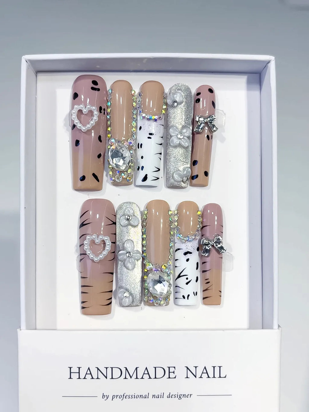 Nude White Silver Black Glitter Heart Bow Pearl Rhinestone Animal Print 3D press on nails full set view
