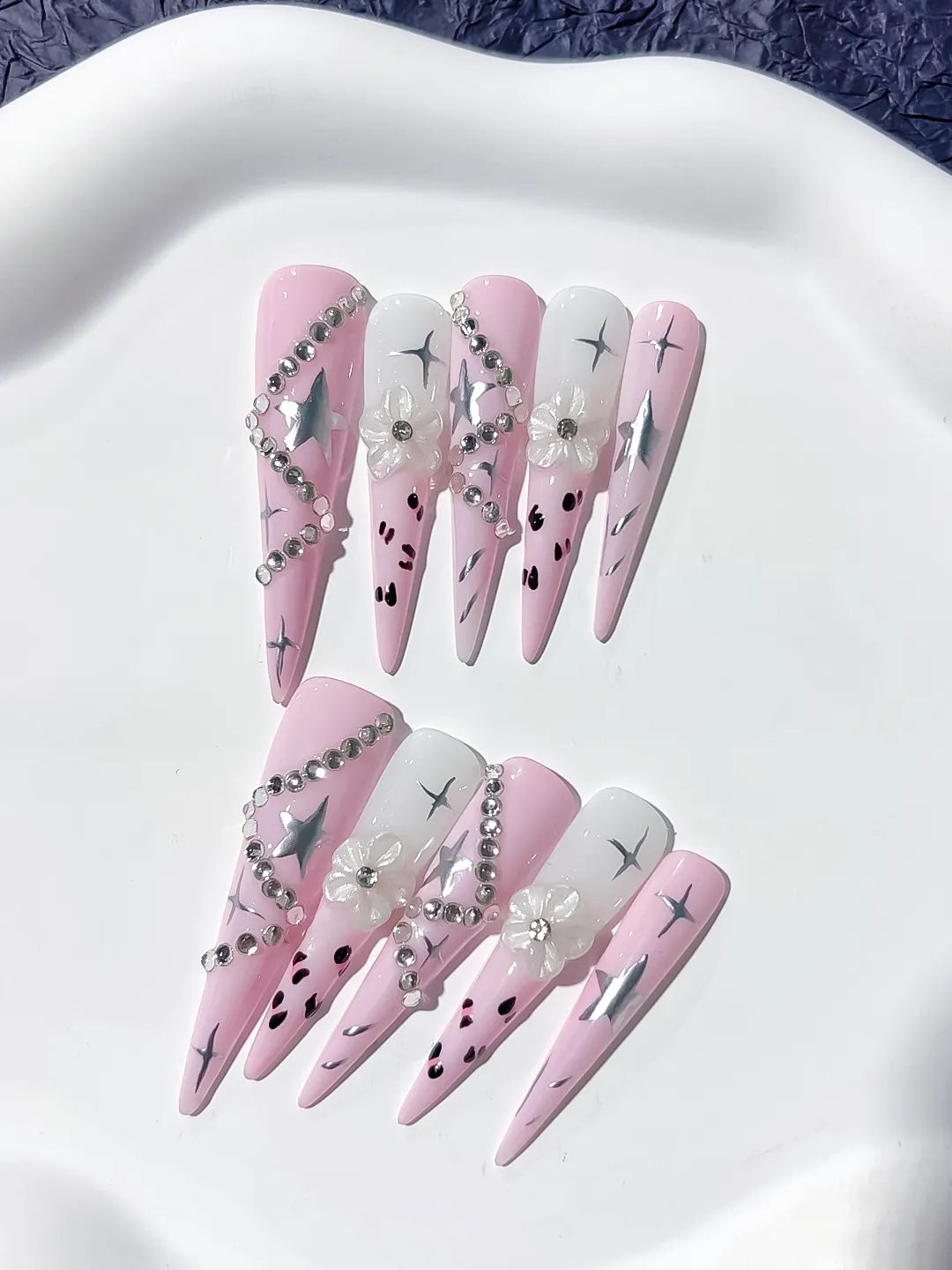 Pink White Silver Black Abstract Star Flower Rhinestone Chain 3D press on nails close up