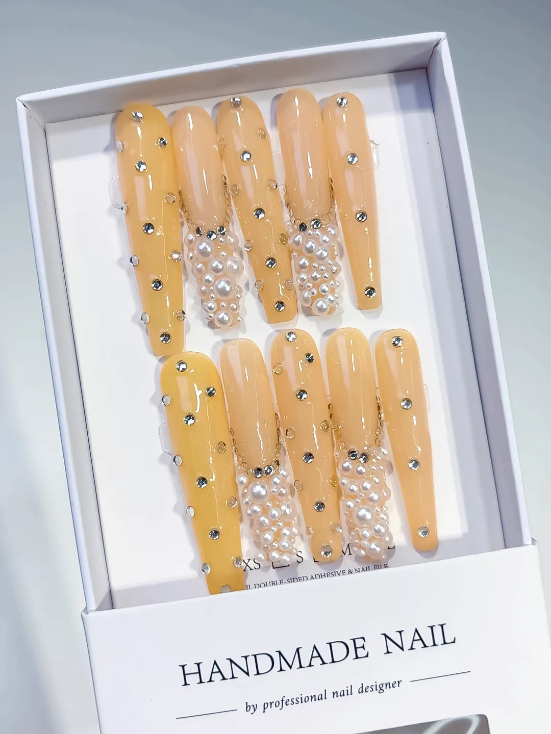 Yellow Silver Solid color Pearl Rhinestone Chain 3D press on nails angled view