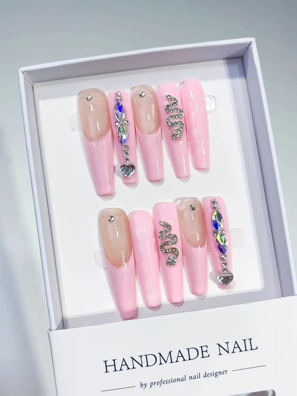 Pink Nude Silver Multicolor Solid color Heart Snake Rhinestone Metallic Accent press on nails angled view