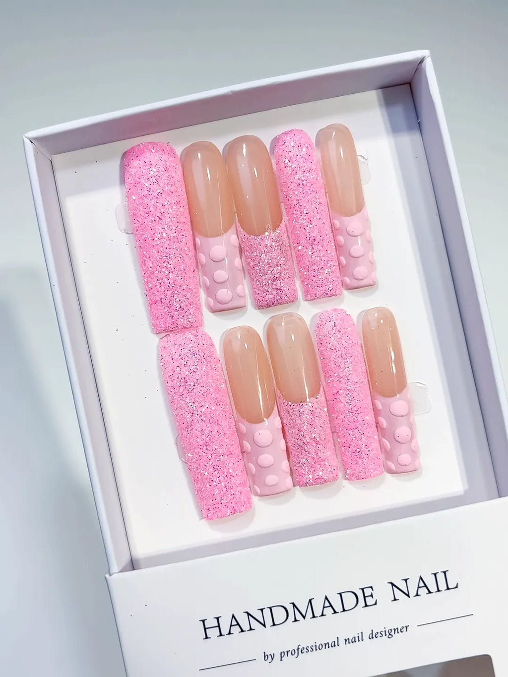 Pink Nude Glitter 3D Texture press on nails angled view