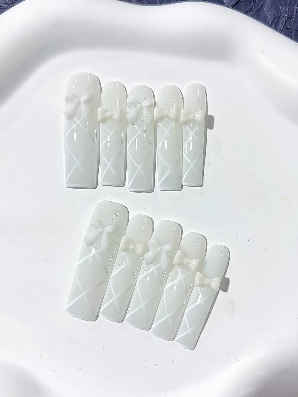 White Solid color Bow Linework 3D press on nails close up