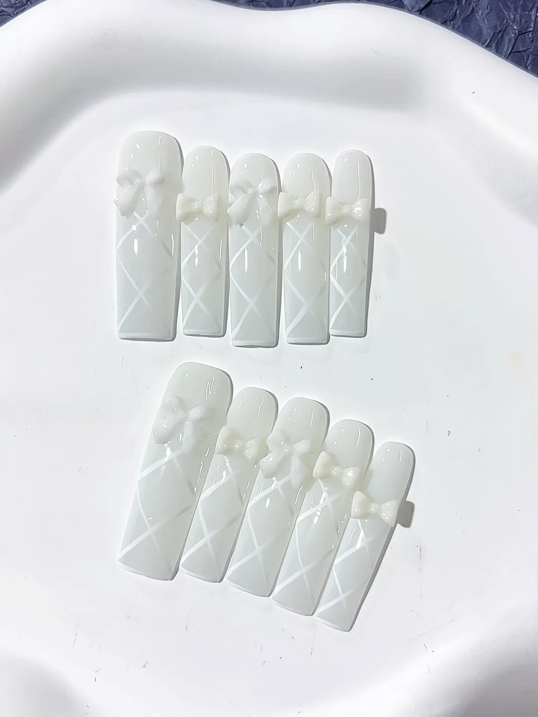 White Solid color Bow Linework 3D press on nails close up