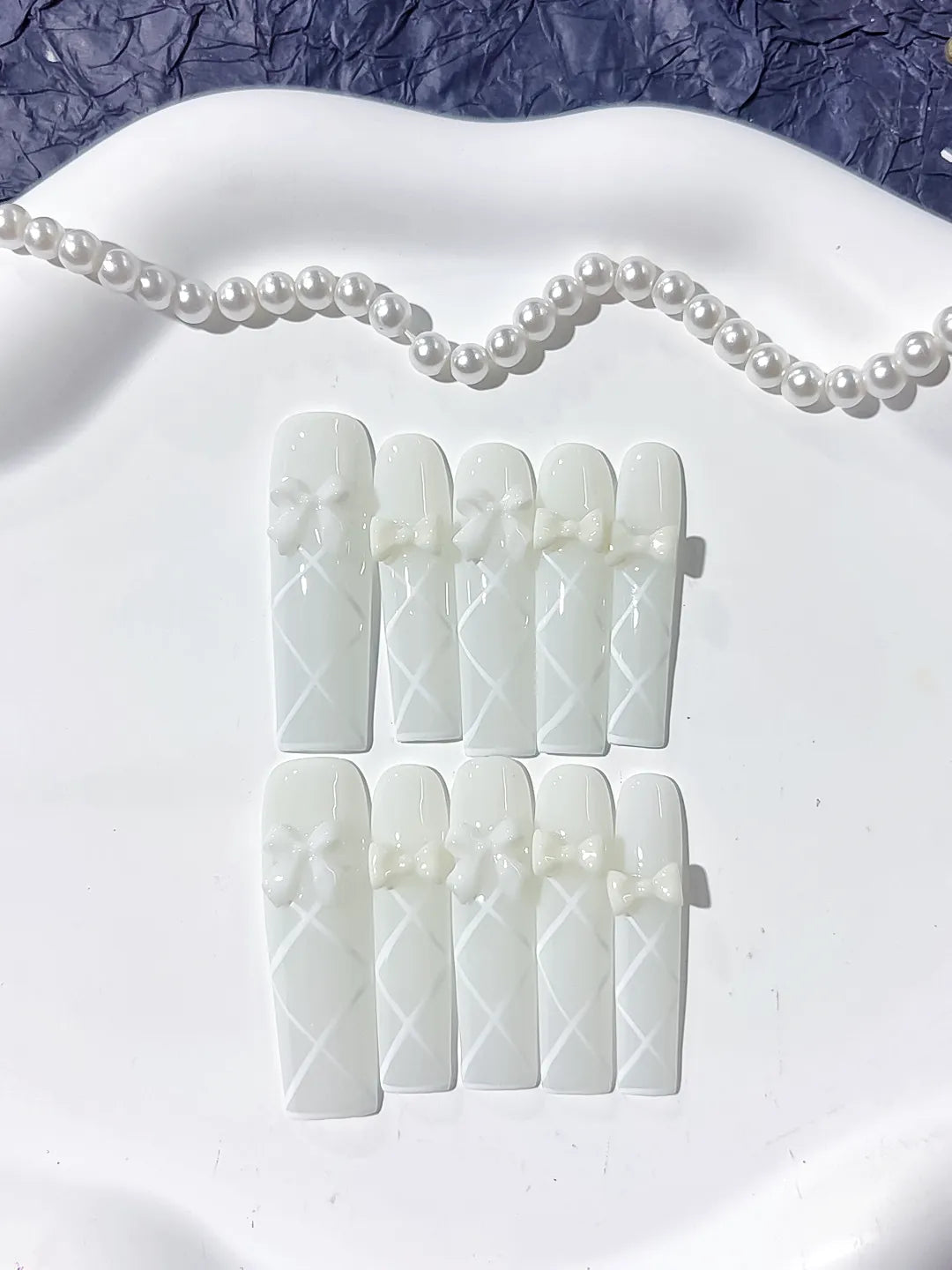 White Solid color Bow Linework 3D press on nails detail view