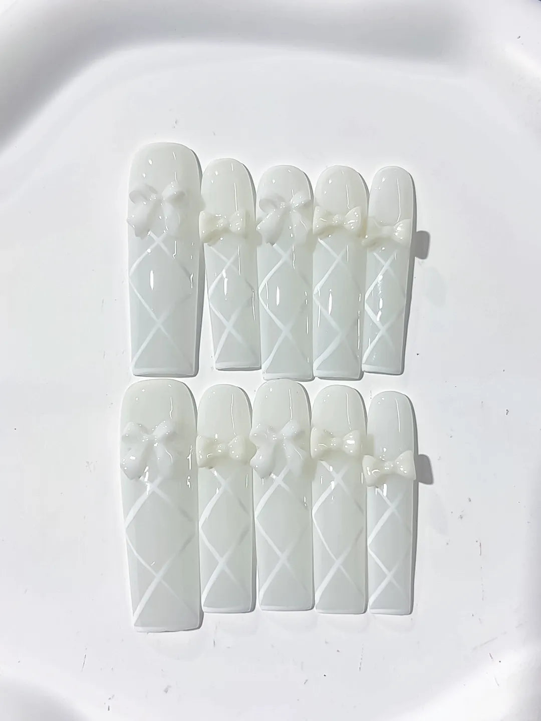 White Solid color Bow Linework 3D press on nails detail view