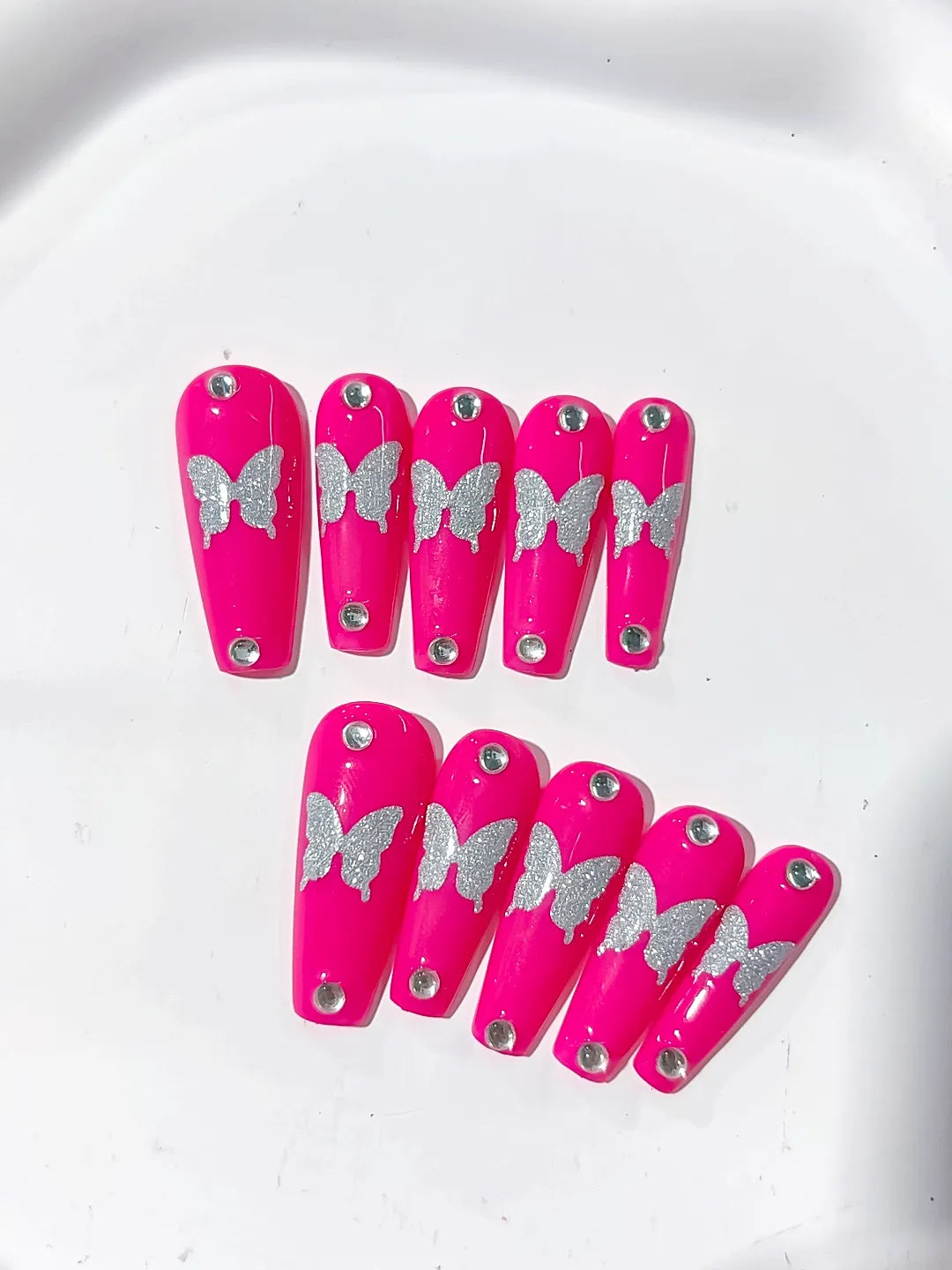 Pink Silver Solid color Butterfly Rhinestone press on nails close up