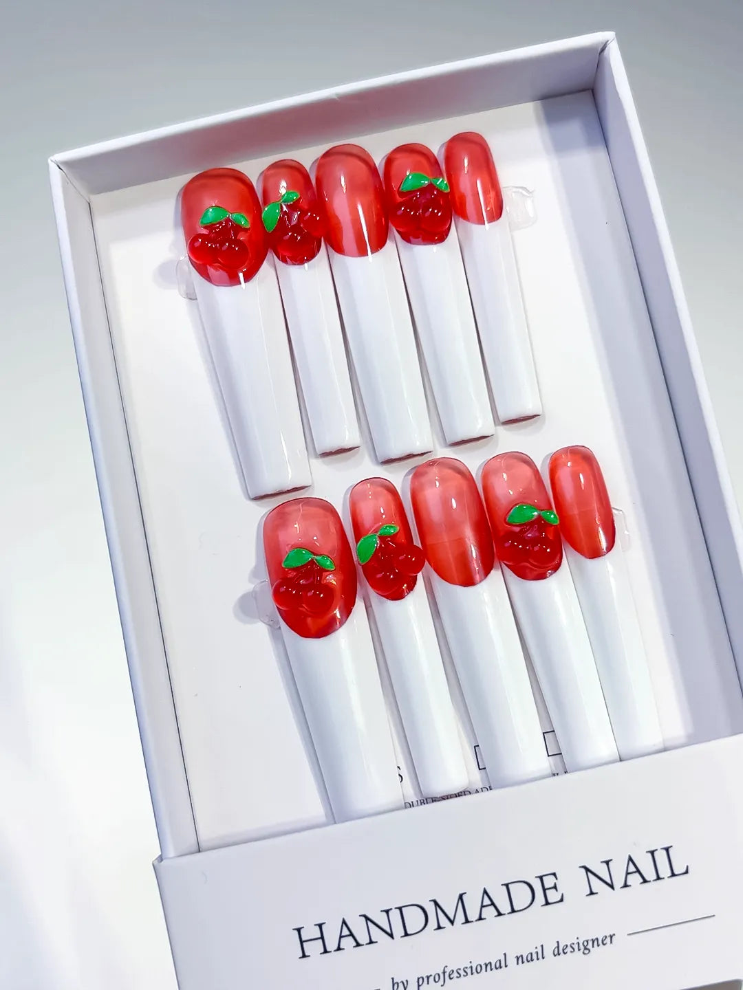 Red White Green Floral Cherry press on nails angled view