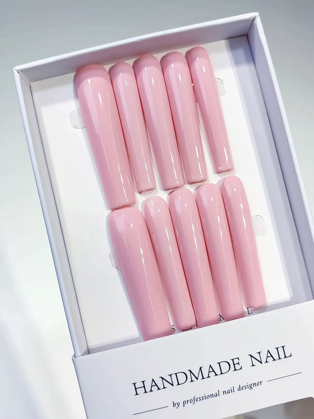 Pink Solid color press on nails angled view
