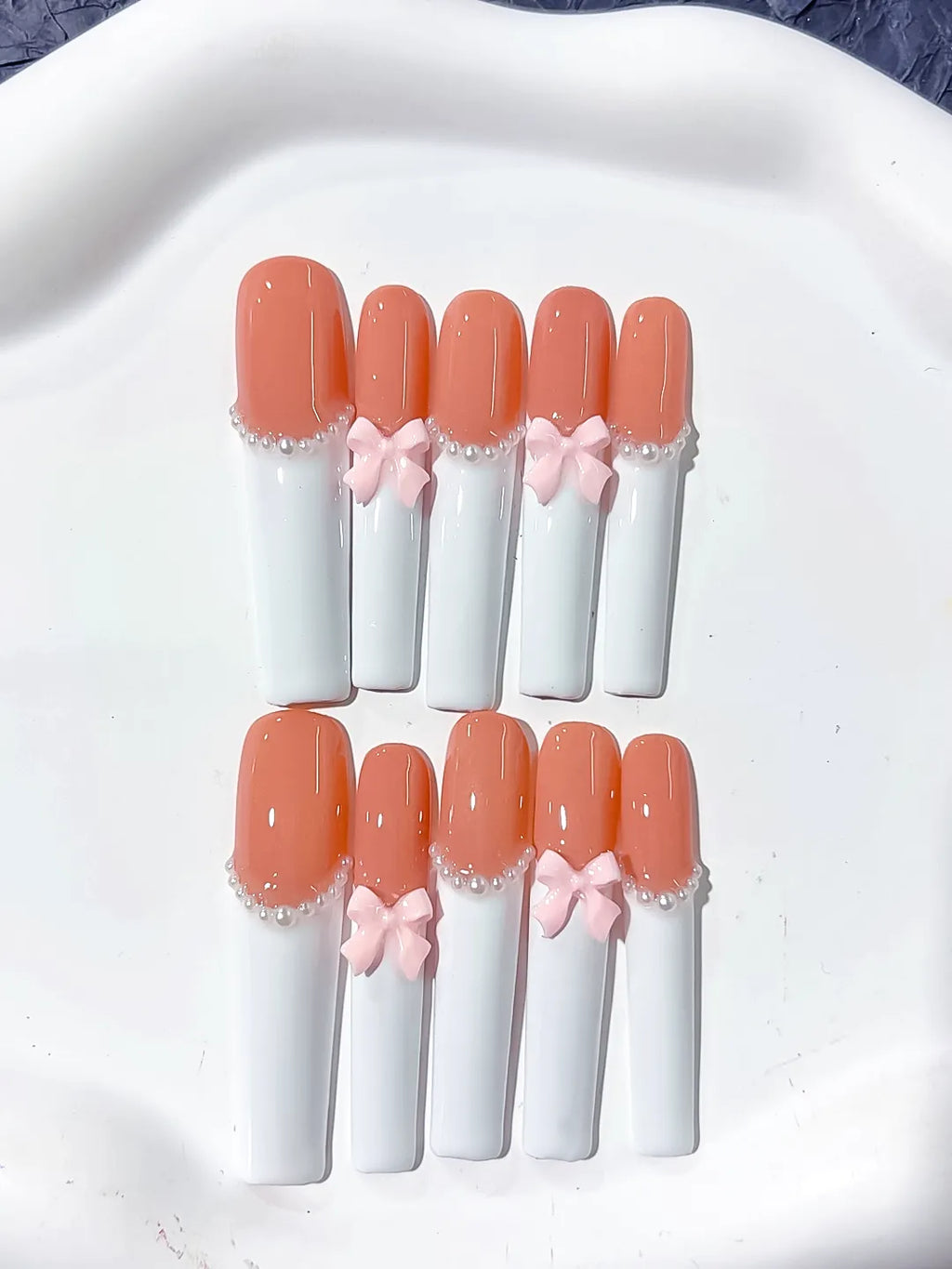 Orange White Pink French tip Bow Pearl 3D press on nails detail view
