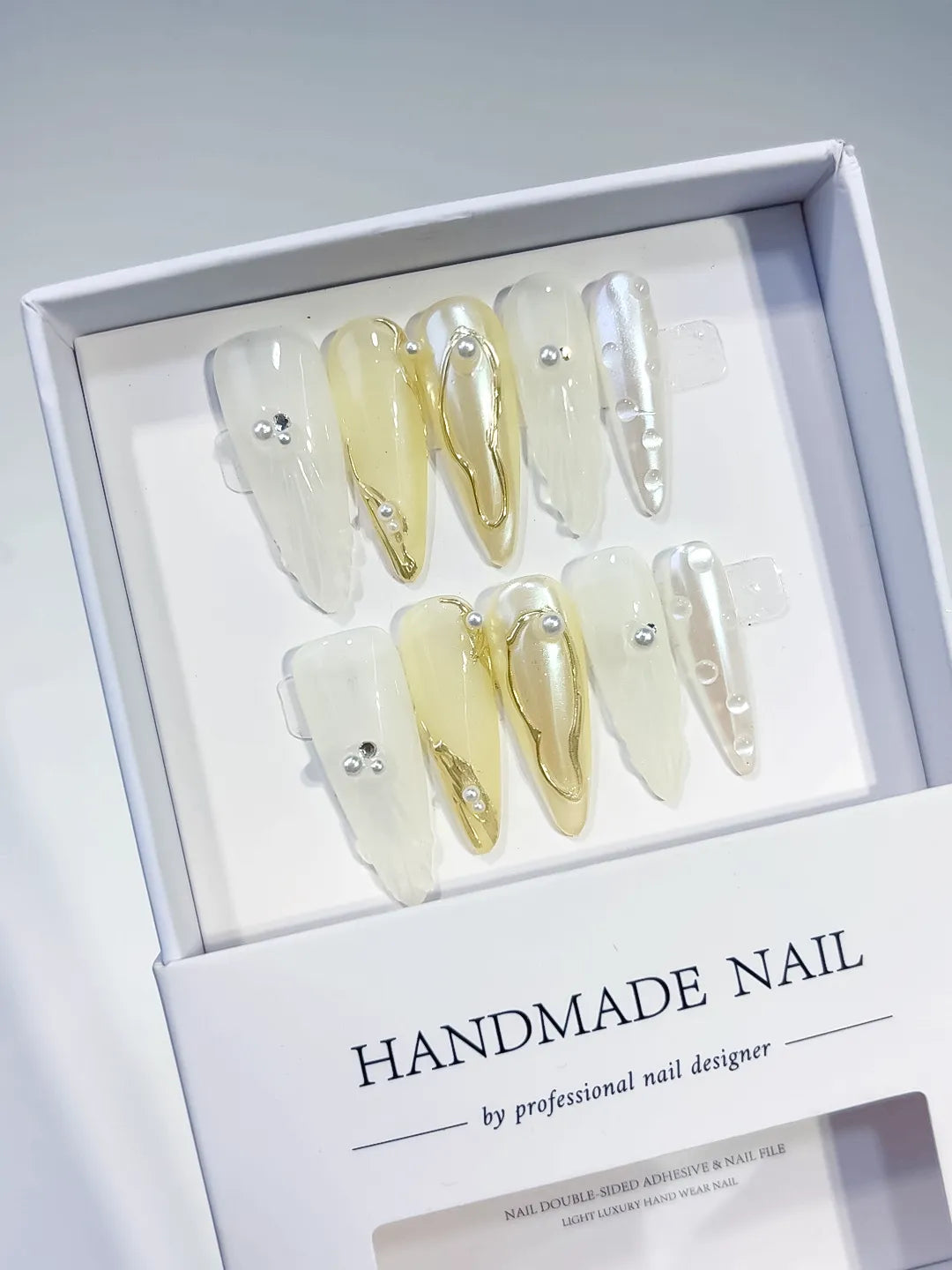 White Gold Silver Holographic Pearl Metallic Accent press on nails angled view