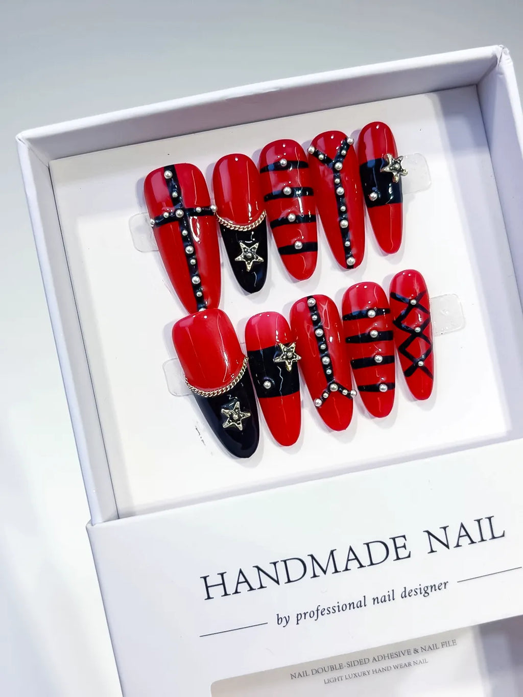 Red Black Silver Abstract Star Chain Stud press on nails angled view