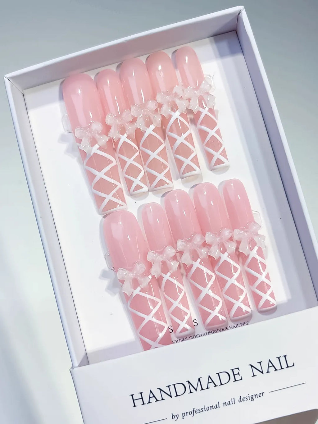 Pink White Solid color Bow Linework 3D press on nails angled view