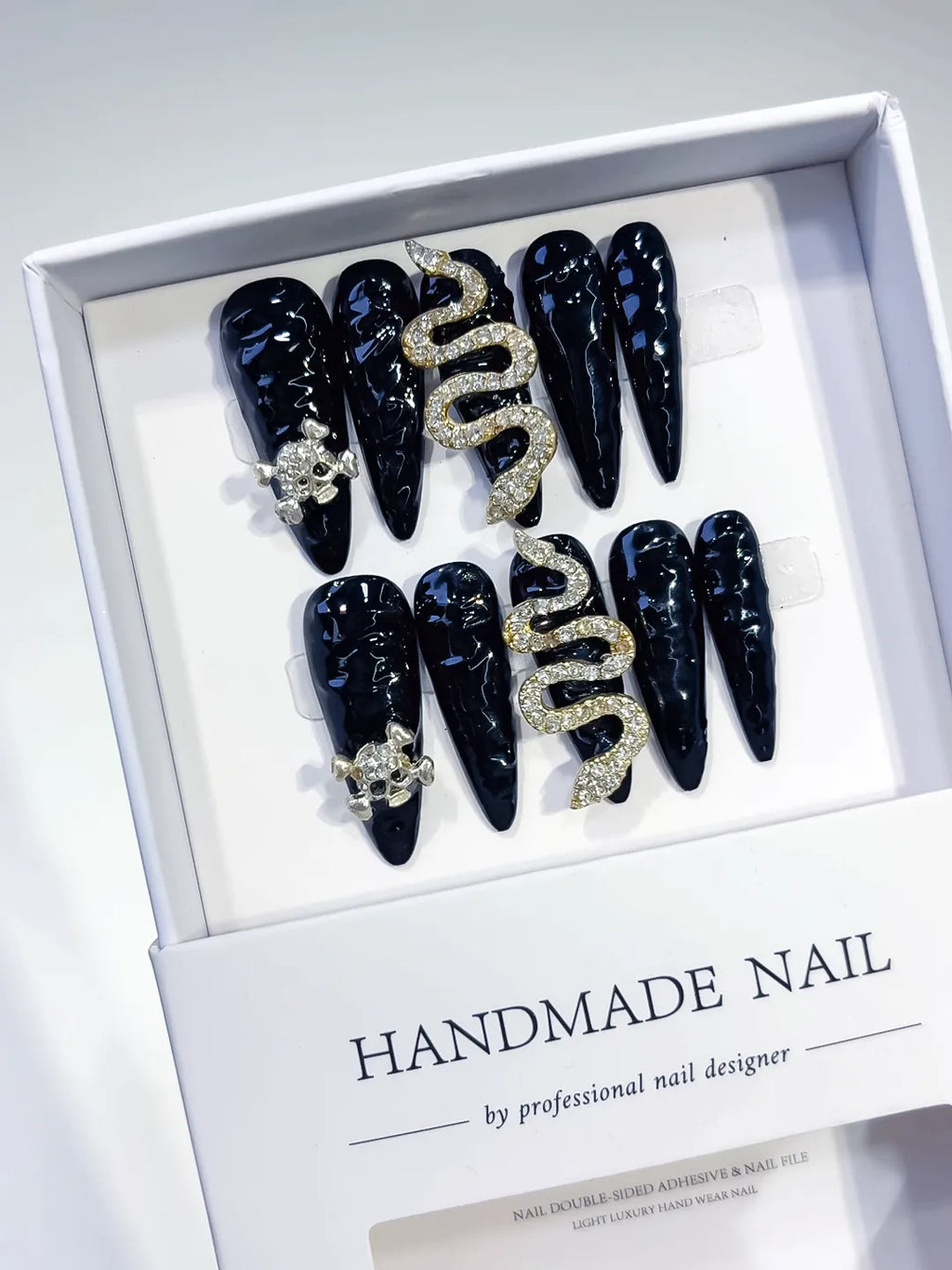 Black Gold Solid color Snake Crown Glitter 3D press on nails angled view