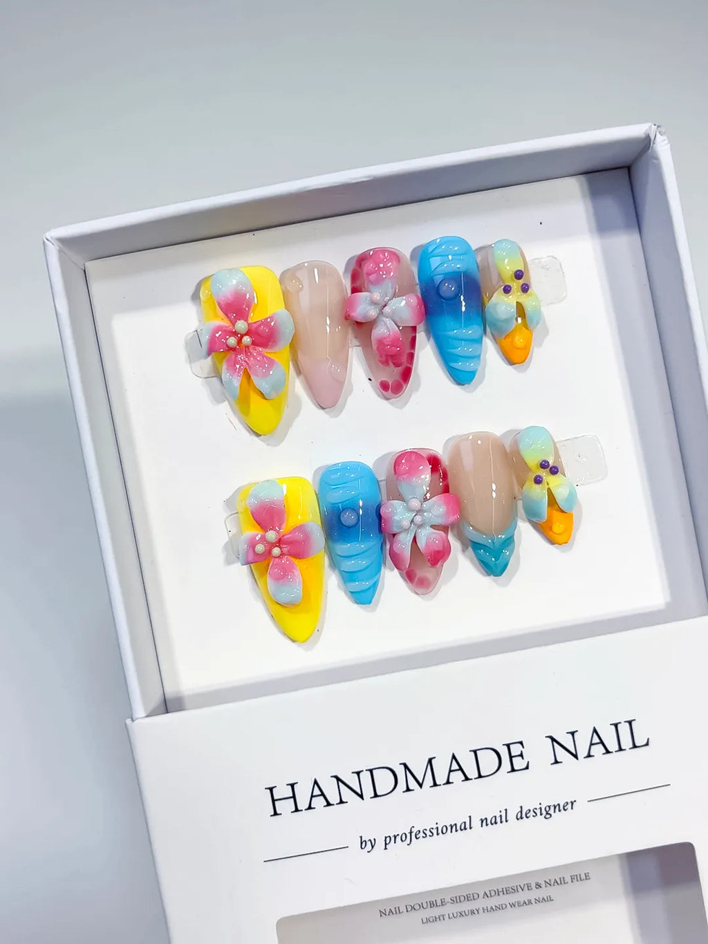 Yellow Blue Pink Nude Orange Purple Abstract Flower Dot 3D Texture press on nails angled view