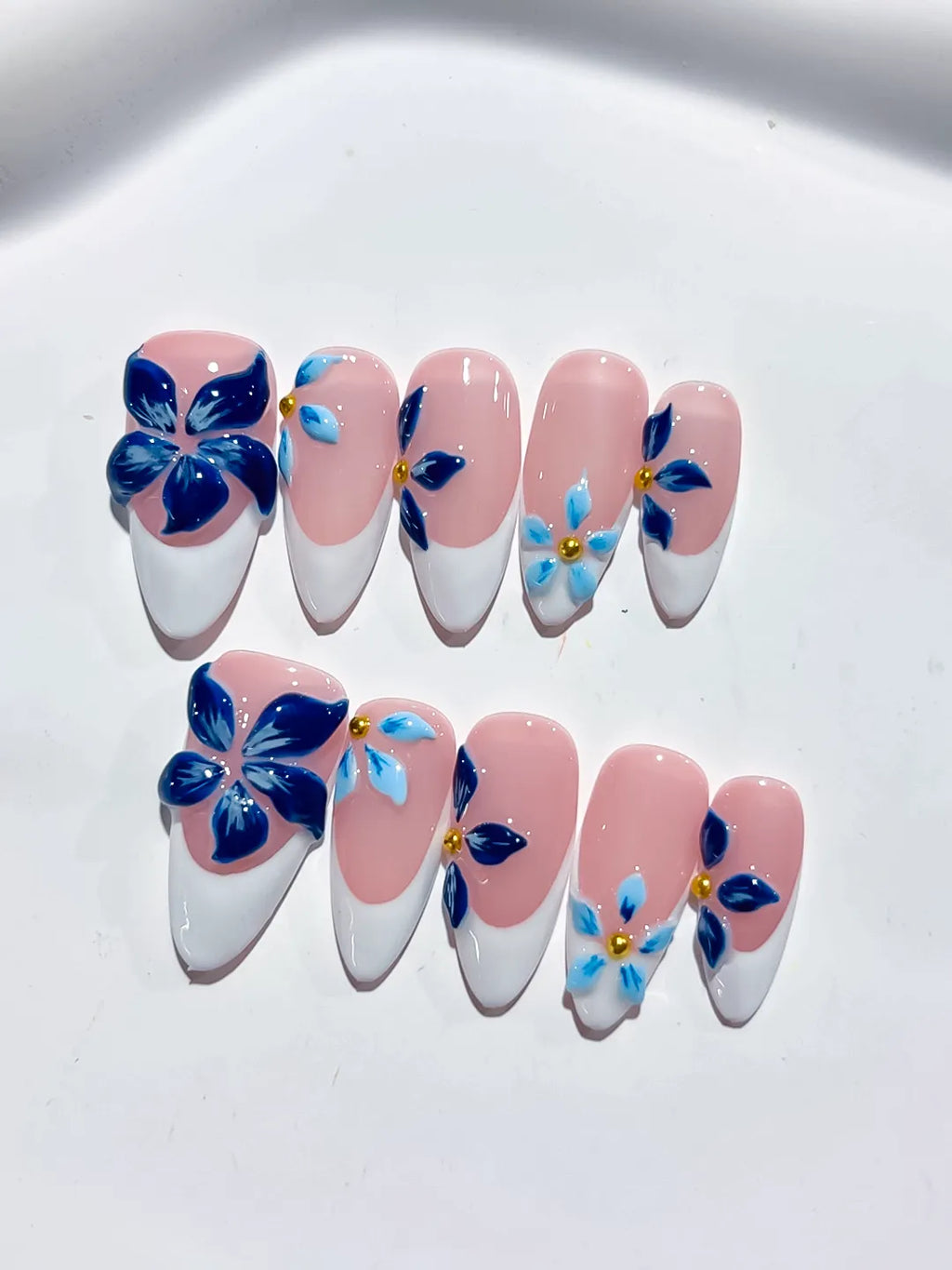 Pink White Blue Gold French tip Flower press on nails close up