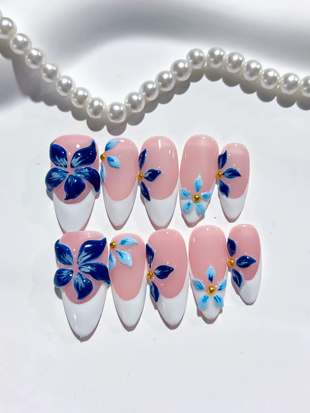 Pink White Blue Gold French tip Flower press on nails detail view