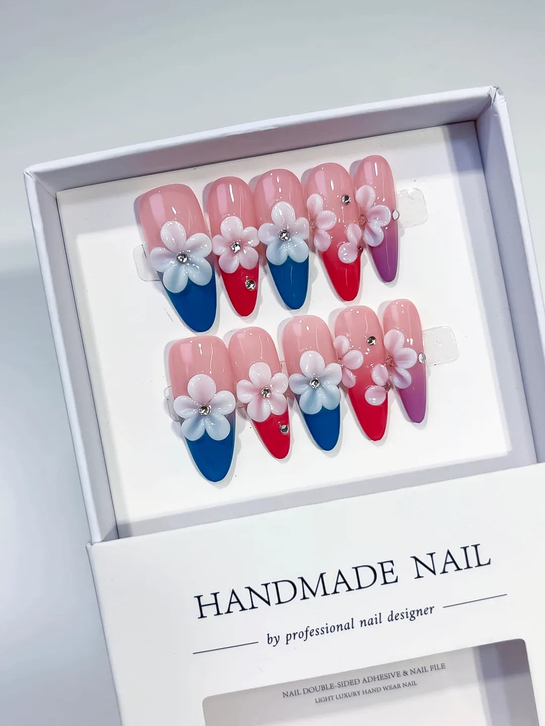 Pink Blue Red Purple White French tip Flower Rhinestone 3D press on nails angled view