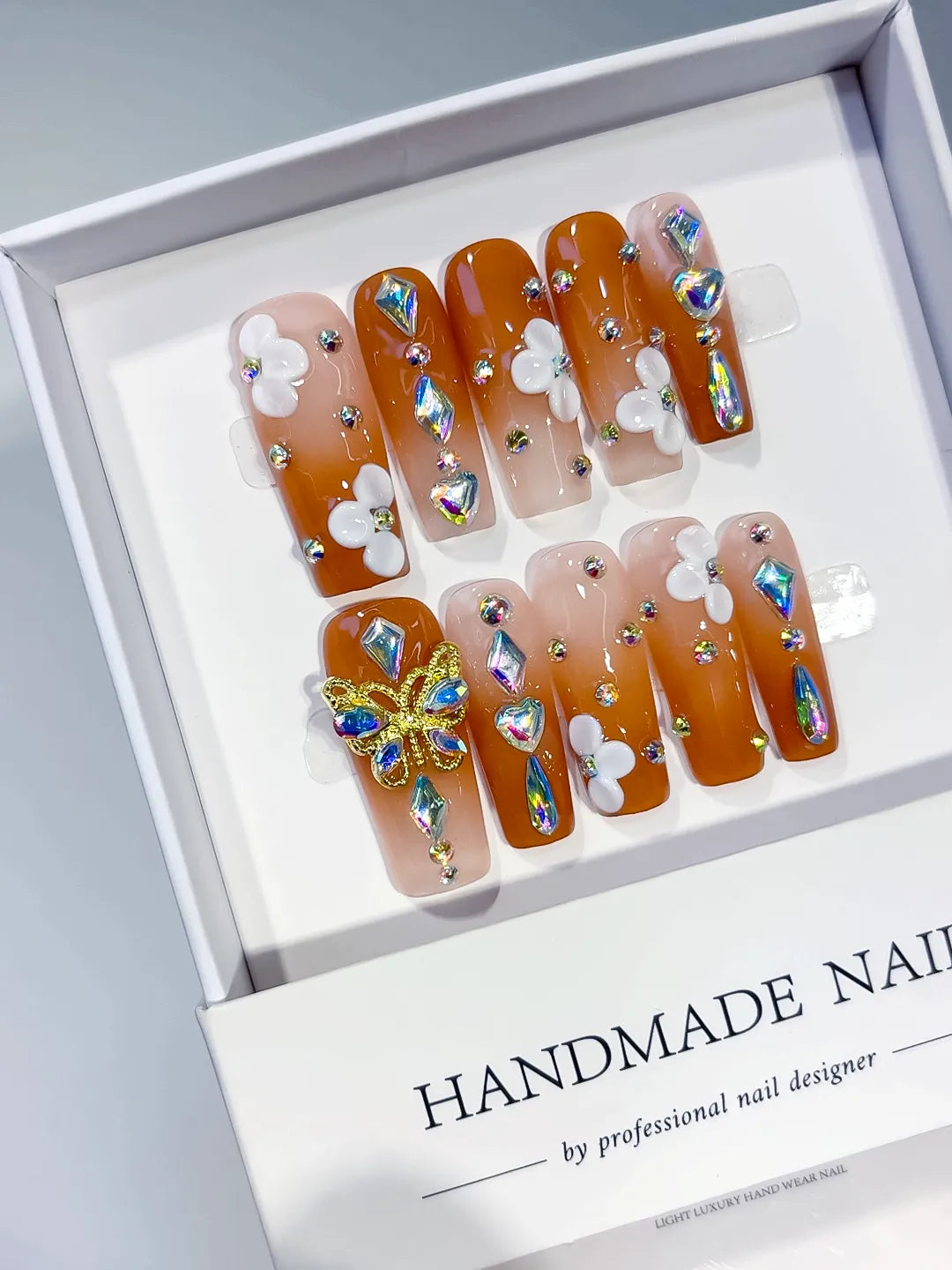 Orange Nude White Gold Multicolor Solid color Butterfly Flower Rhinestone 3D press on nails angled view