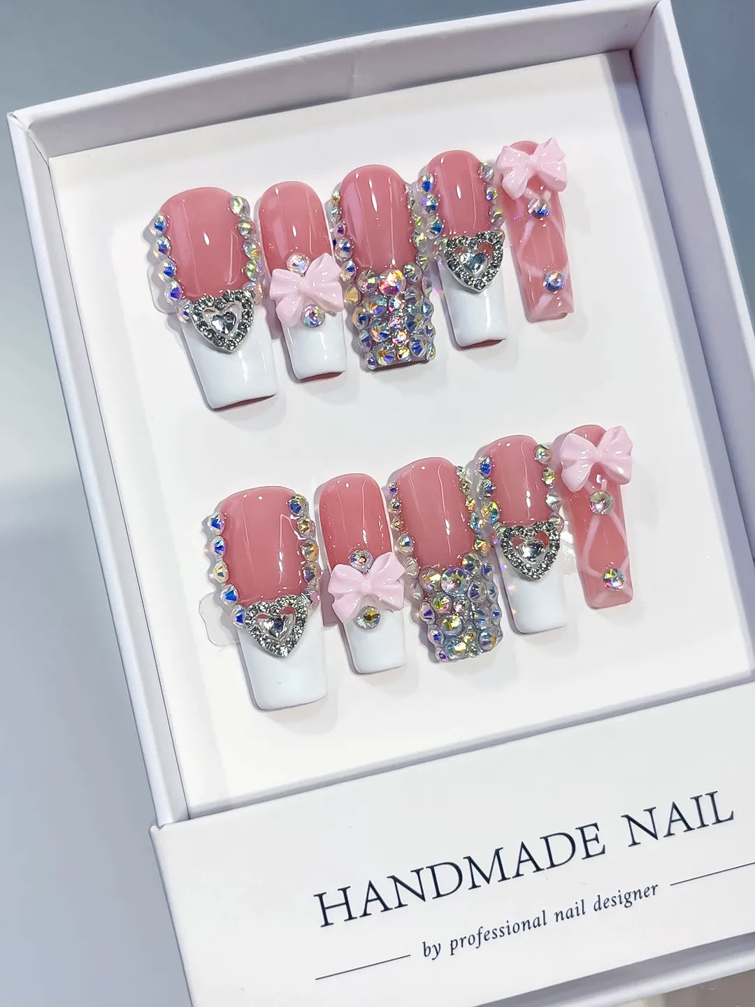 Pink White Silver Multicolor French tip Heart Bow Rhinestone 3D press on nails angled view