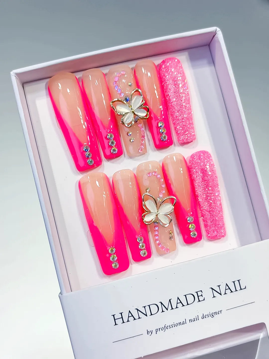 Pink Nude Silver Ombre Butterfly Rhinestone Glitter press on nails angled view