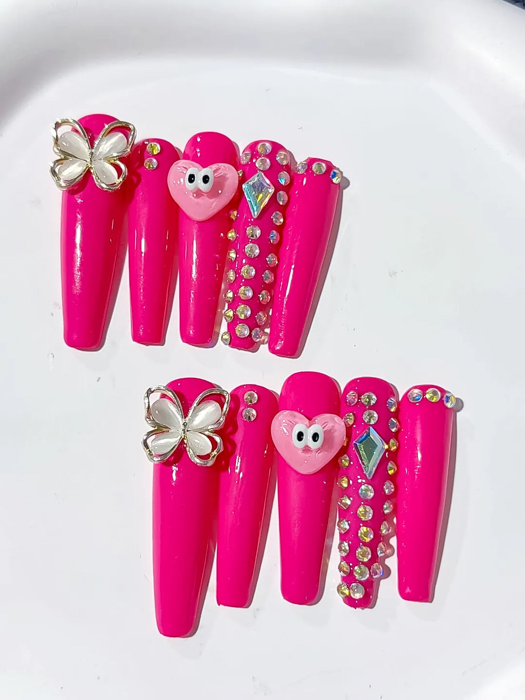 Pink Silver Solid color Heart Butterfly Rhinestone press on nails close up
