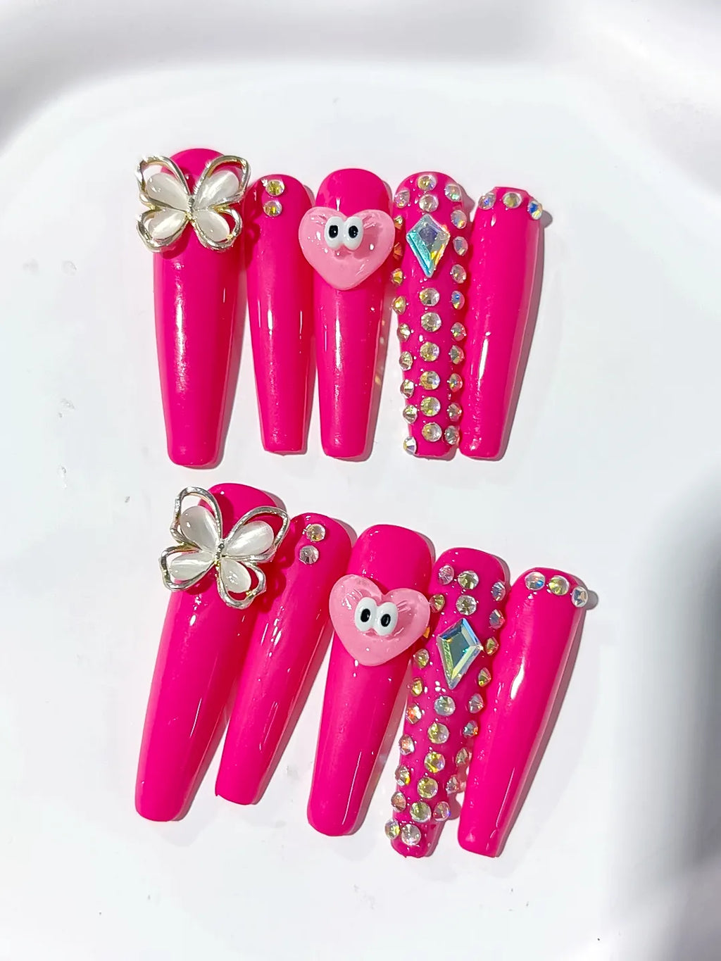Pink Silver Solid color Heart Butterfly Rhinestone press on nails detail view