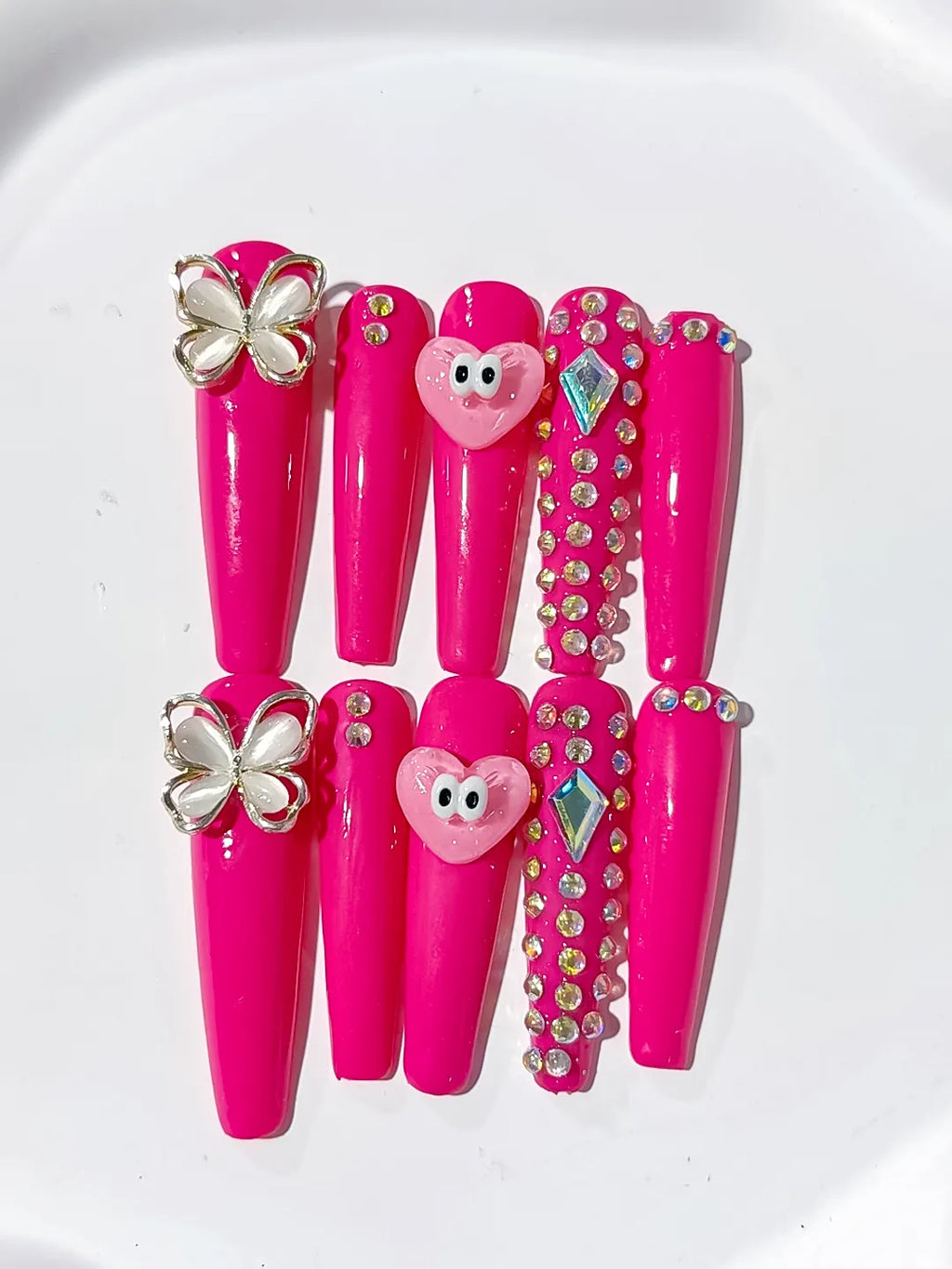 Pink Silver Solid color Heart Butterfly Rhinestone press on nails detail view