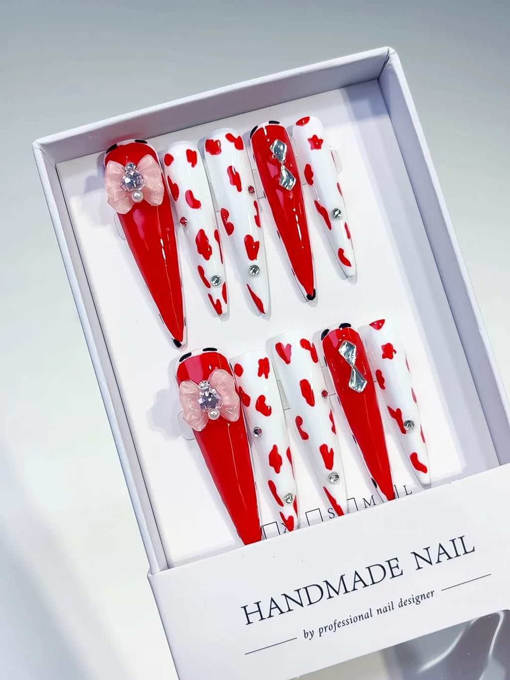 Red White Silver Abstract Flower Animal Print Rhinestone press on nails angled view
