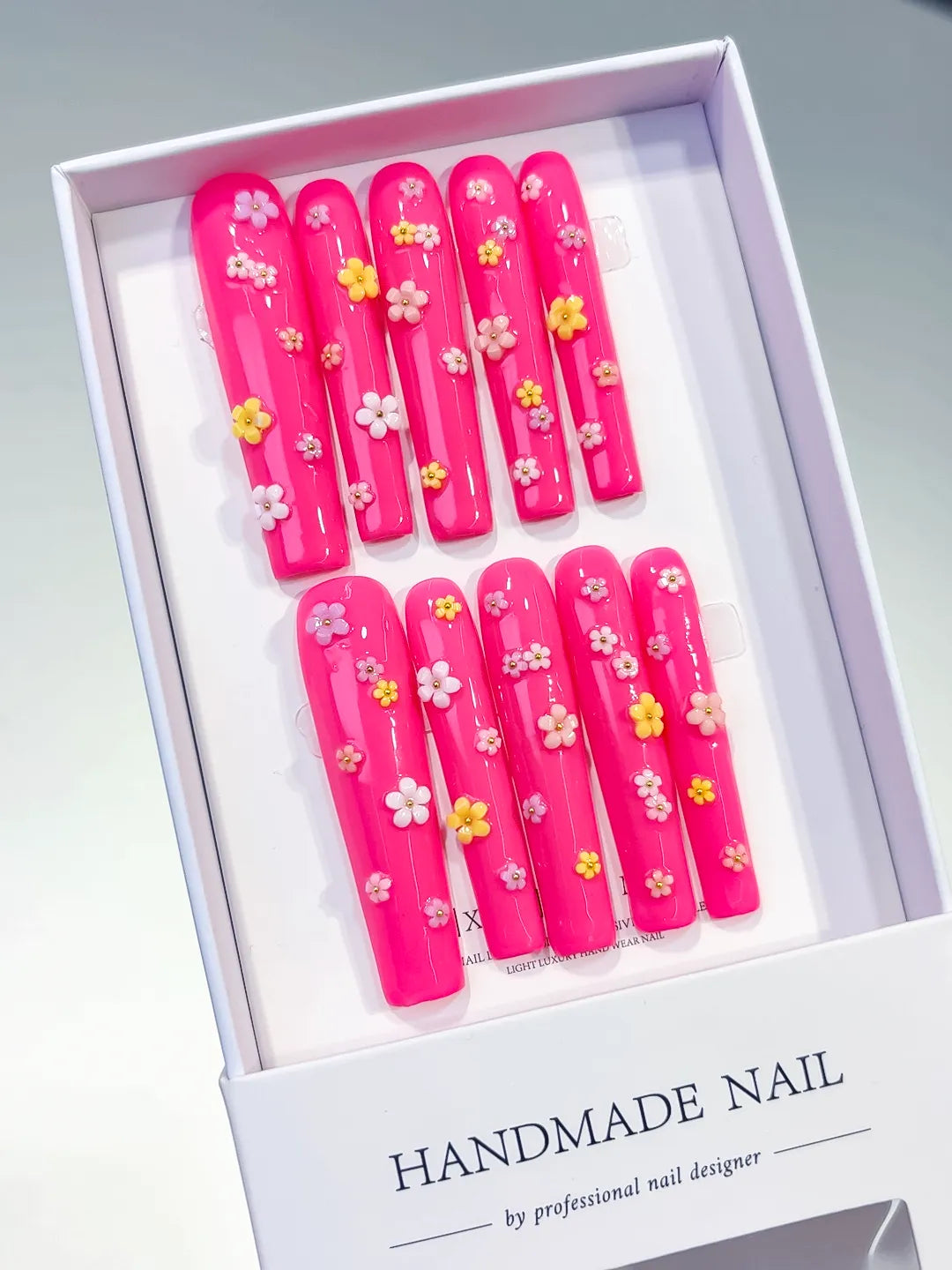 Pink White French tip Flower Shell Star press on nails angled view