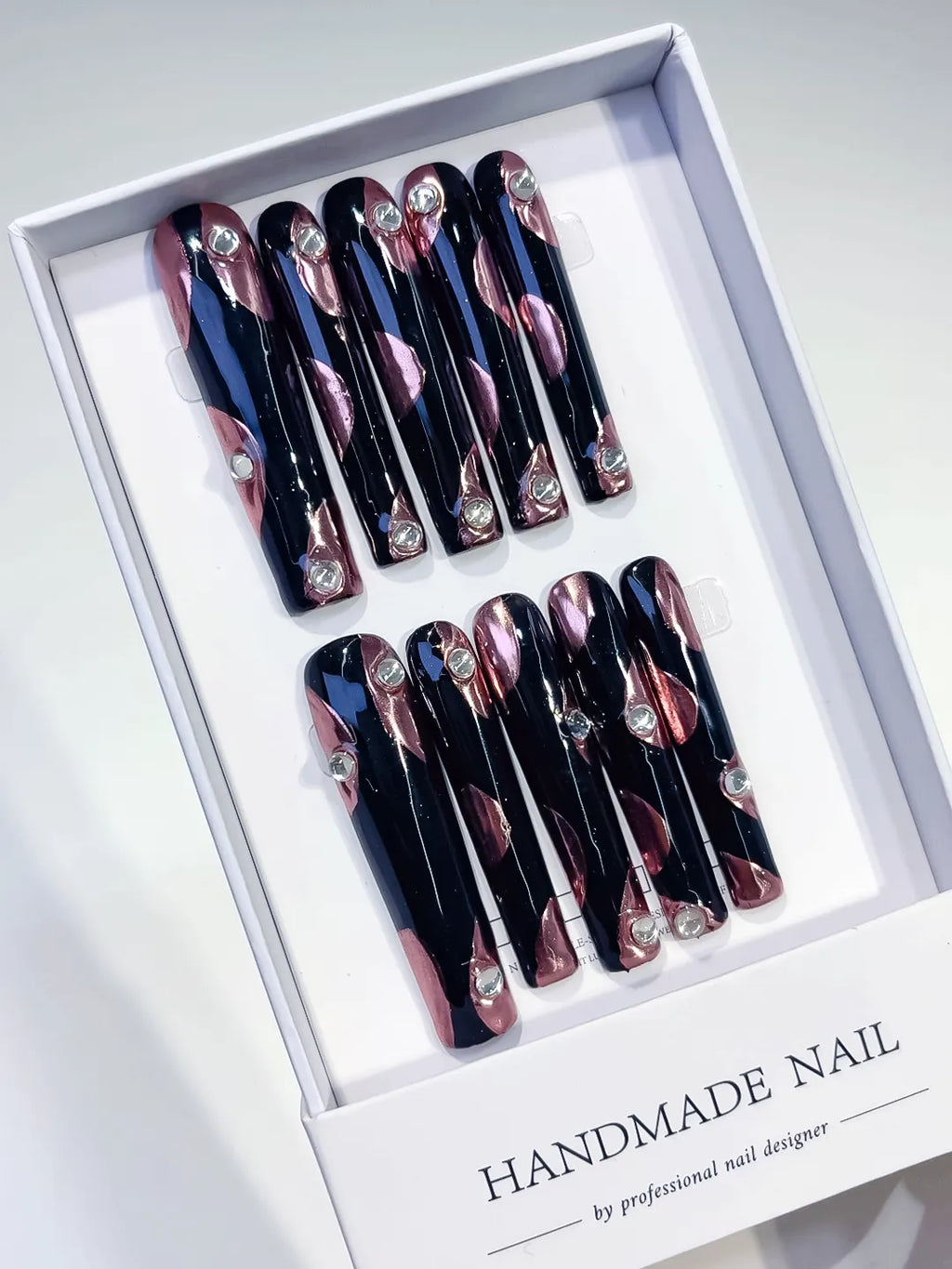 Pink White Black French tip Flower Heart press on nails angled view