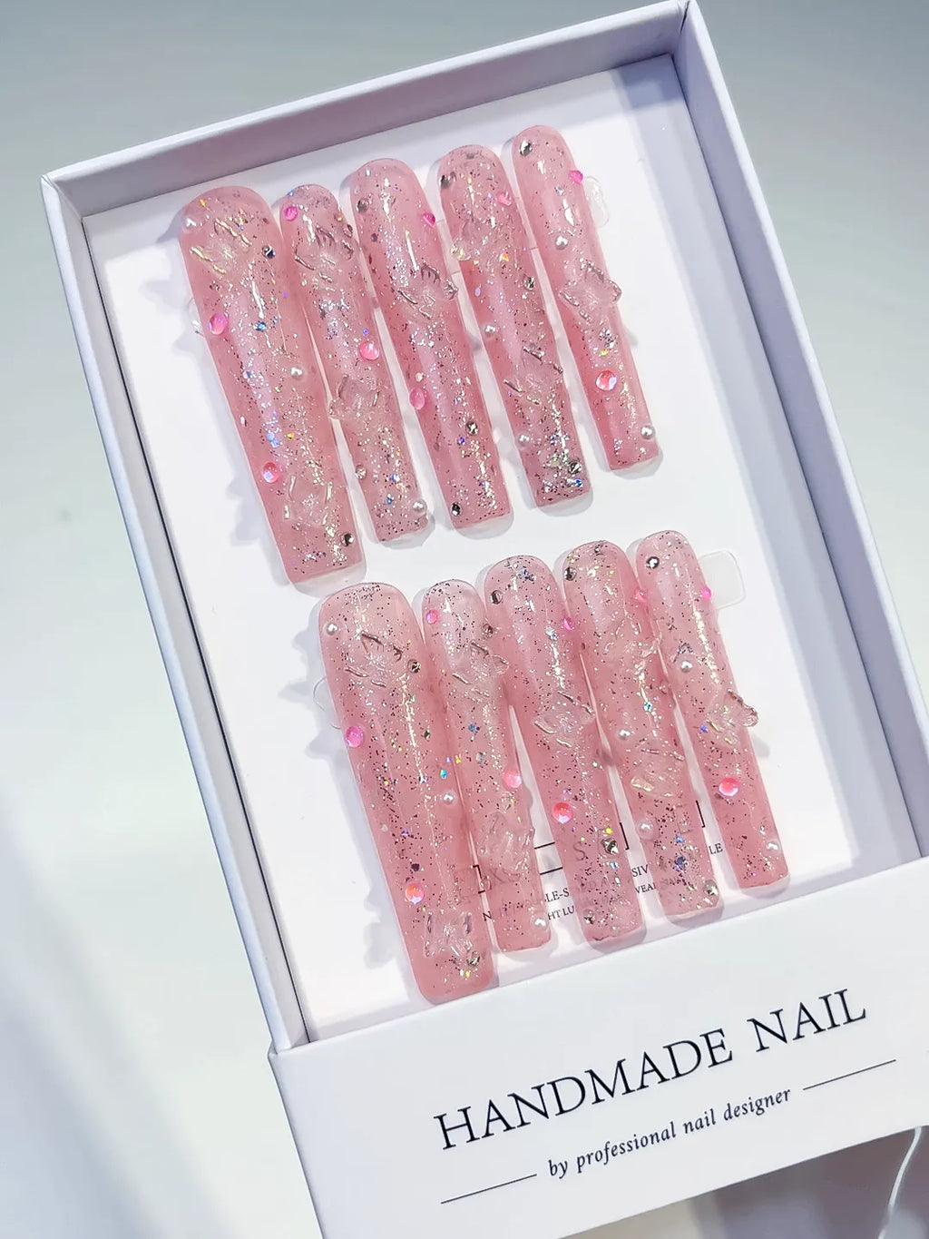 Pink Black Purple Green Yellow Abstract Flower Star Rhinestone press on nails angled view