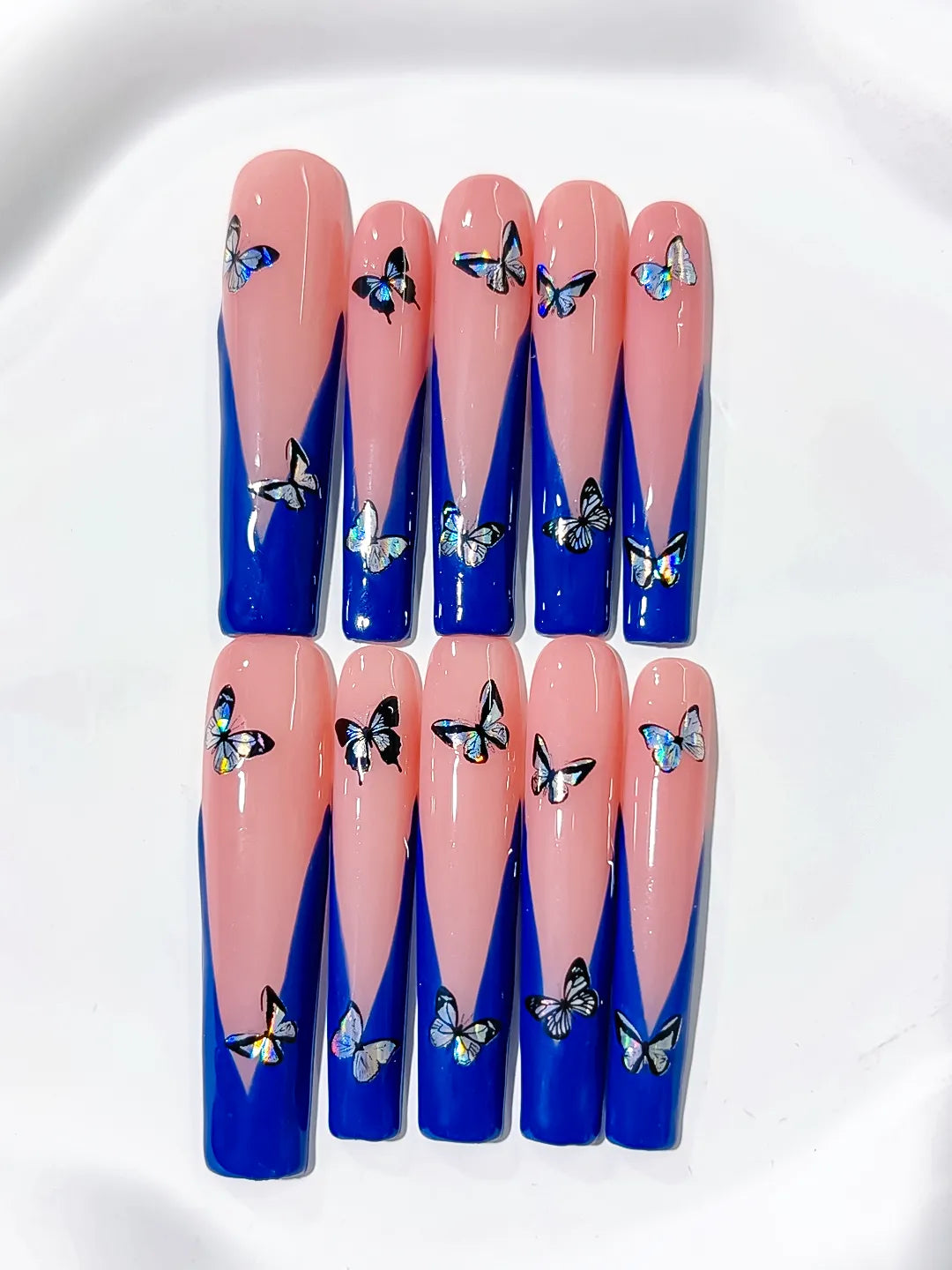 Pink Blue French tip Butterfly press on nails angled view